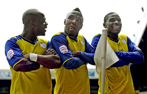 From left to right: Leroy, Jermaine Johnson and Jeremy Helan celebrate Johnson's goal for Sheffield Wednesday at Leeds United in 2013. Photo courtesy of Sheffield Newspapers