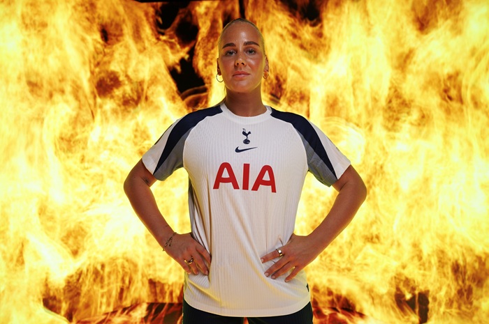 Cathinka Tandberg pictured in a Spurs kit with a fire effect around her